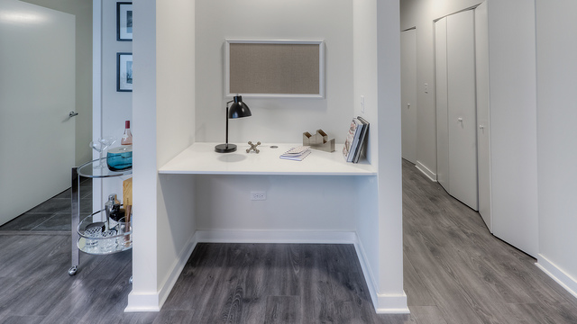 Undisclosed Address Chicago, IL 60657 - Photo 14 of 17 a hallway with view of wooden floor