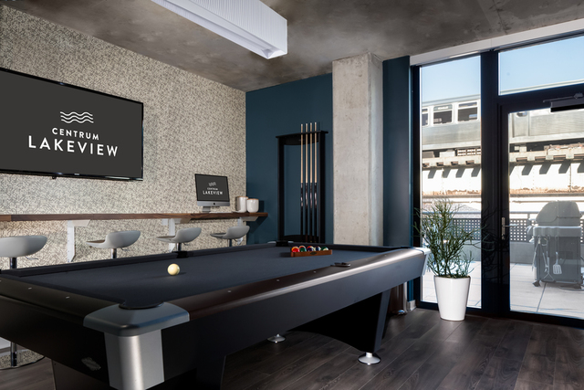 Undisclosed Address Chicago, IL 60657 - Photo 4 of 17 a living room with furniture and a table