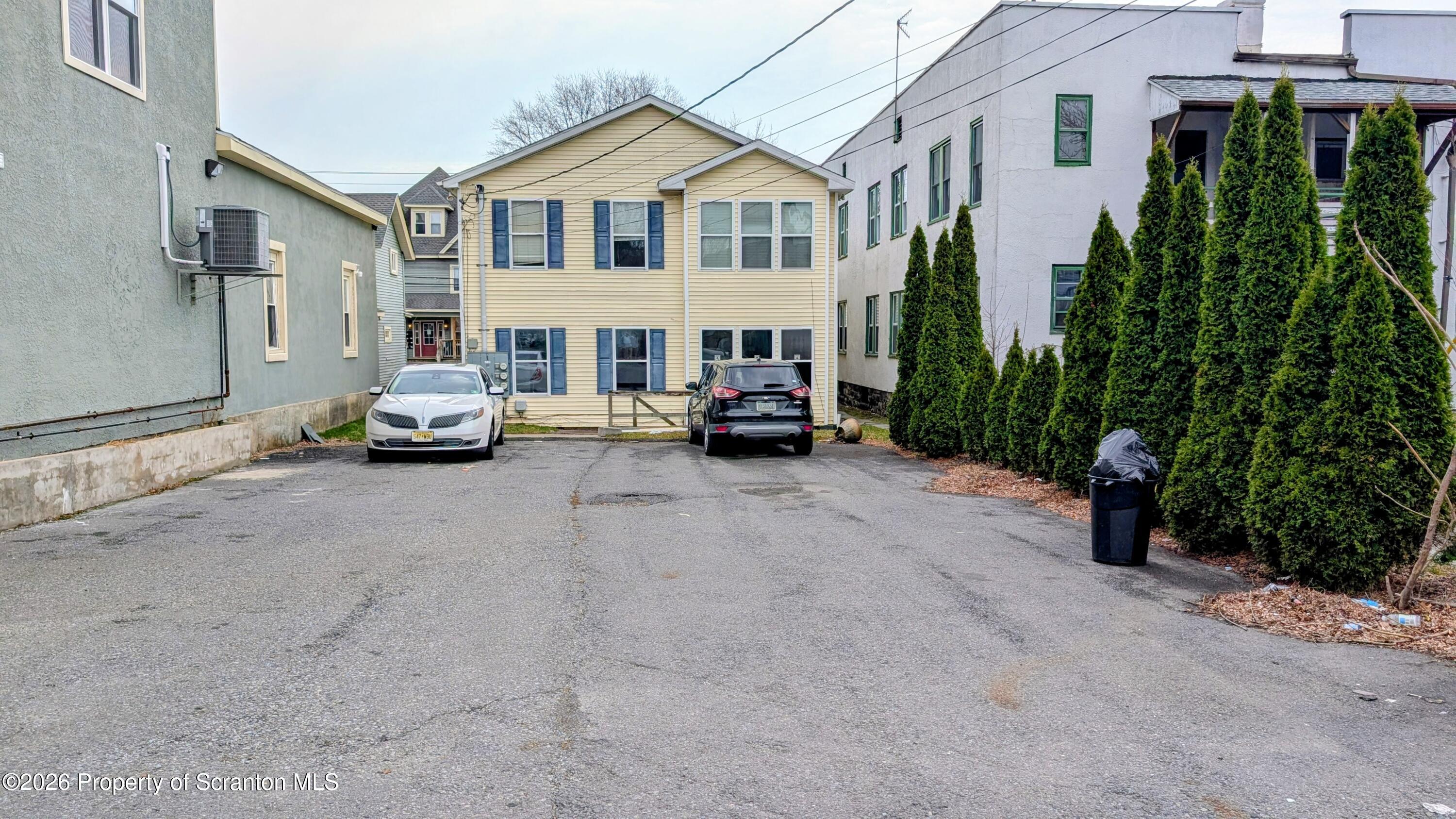 114 Prospect Avenue, Unit 4 Scranton, PA 18505 - Photo 1 of 16 a view of multiple houses with a street