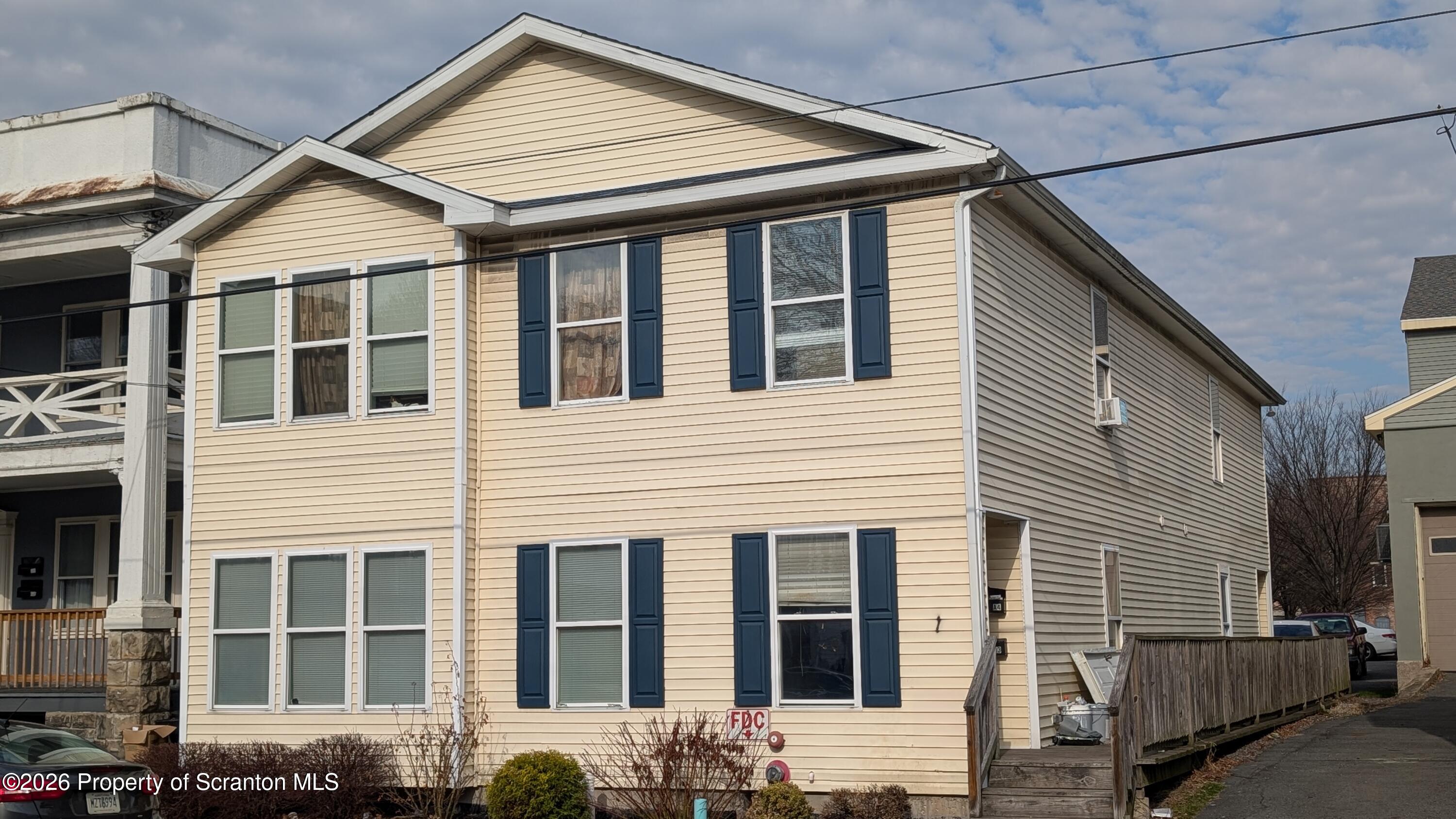 114 Prospect Avenue, Unit 4 Scranton, PA 18505 - Photo 16 of 16 a view of a house with large windows