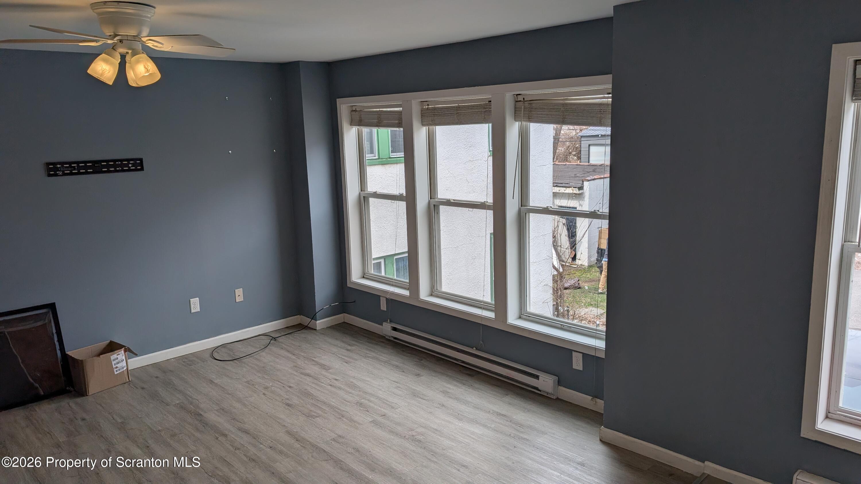 114 Prospect Avenue, Unit 4 Scranton, PA 18505 - Photo 7 of 16 a view of an empty room with a window