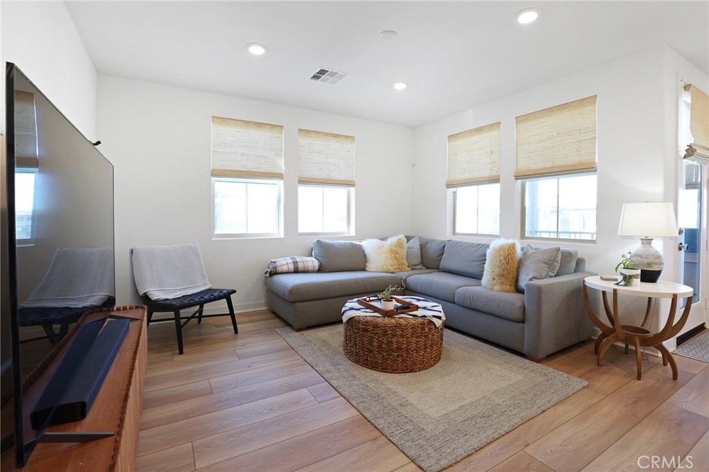 1300 Lasso Way, Unit 301 Rancho Mission Viejo, CA 92694 - Photo 2 of 17 a living room with furniture and a window