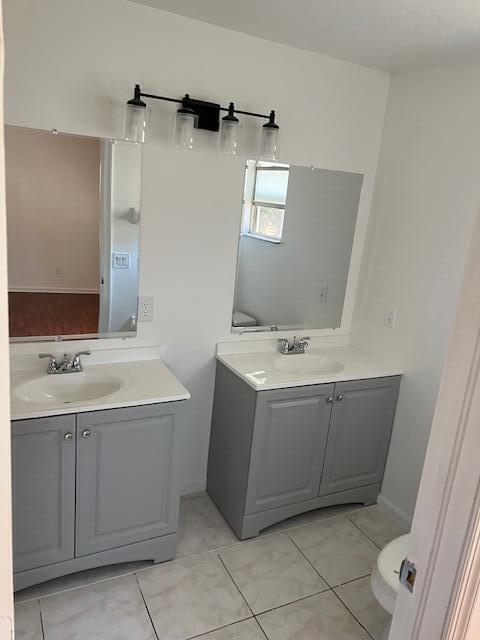 140 Baldwin Boulevard Greenacres, FL 33463 - Photo 15 of 18 a utility room with a sink washer and dryer