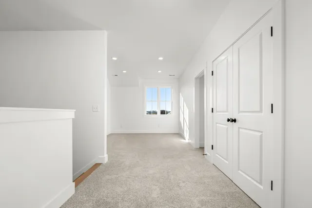 a view of a livingroom with closet area