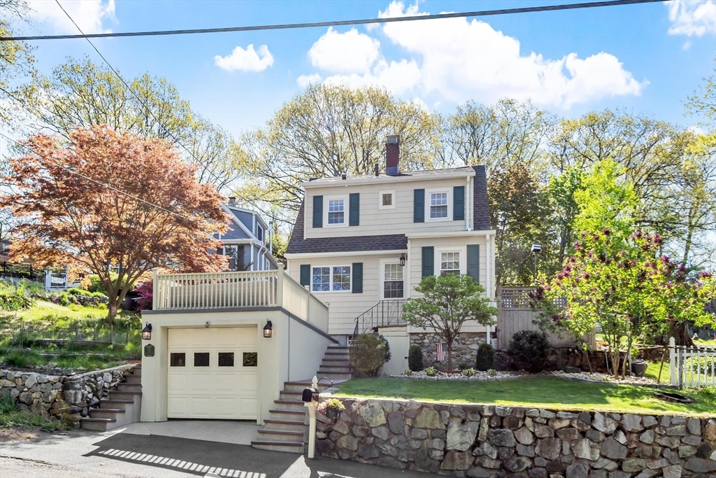 25 Naples Road Melrose, MA 02176 - Photo 28 of 36 a house that has a tree in front of the house