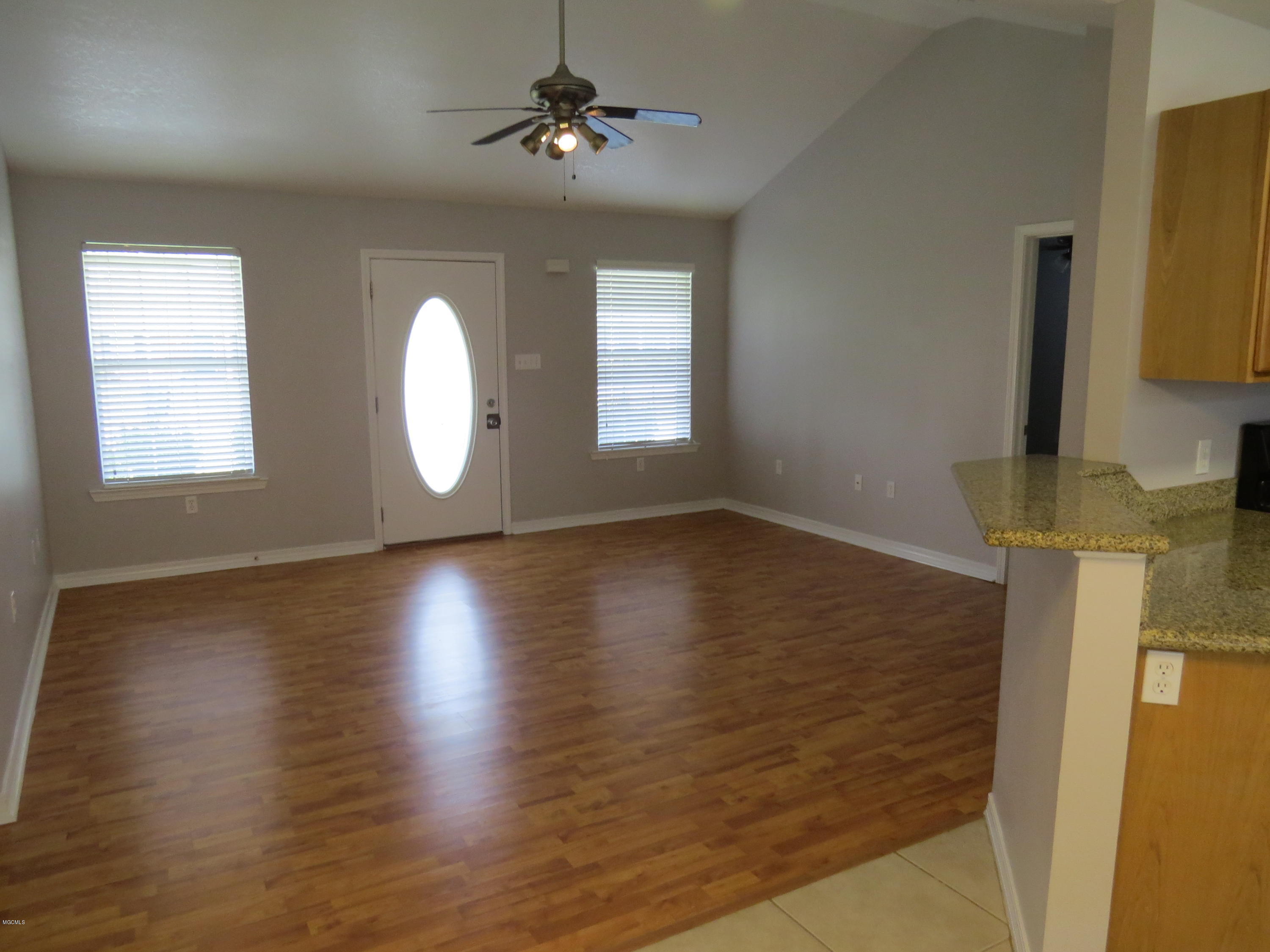 22113 Rayvan Lane Kiln, MS 39556 - Photo 9 of 23 Kitchen to Living Room