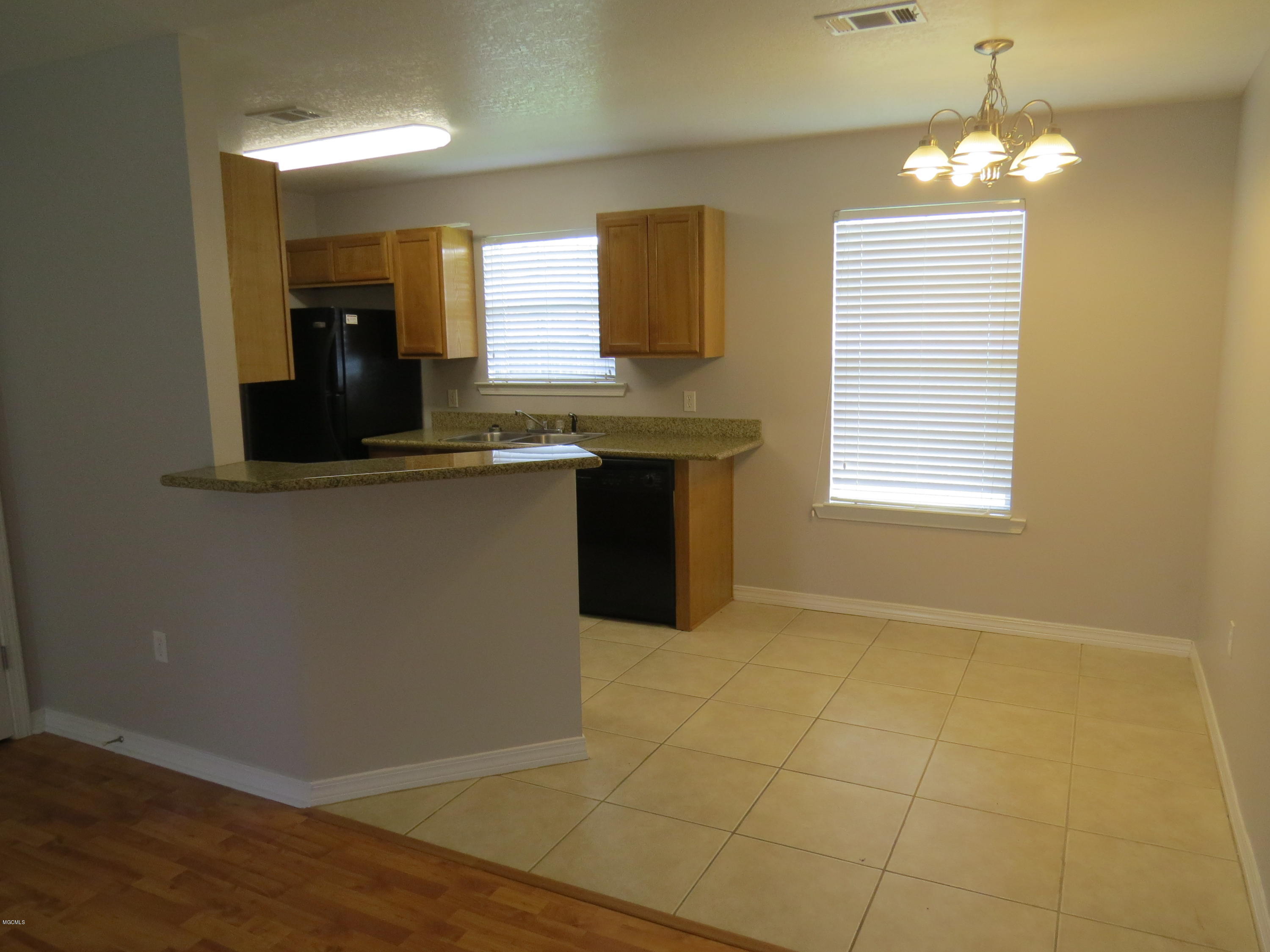 22113 Rayvan Lane Kiln, MS 39556 - Photo 10 of 23 Living Room to Kitchen