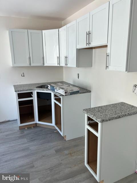 17 State Hill Road Wyomissing, PA 19610 - Photo 4 of 15 a kitchen with granite countertop a stove and a sink