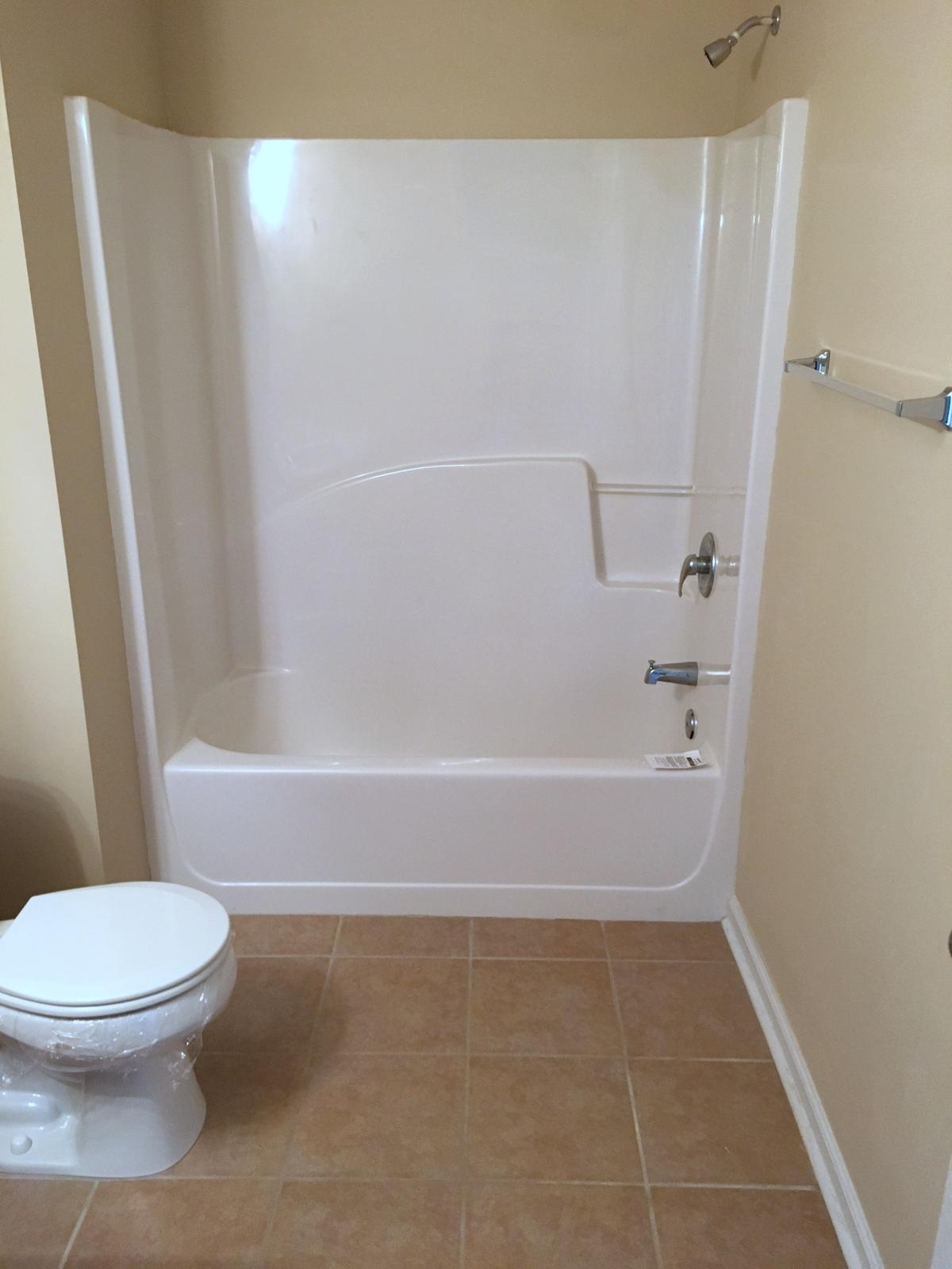 599 Bay Grove Road Freeport, FL 32439 - Photo 14 of 29 a bathroom with a toilet and a bathtub