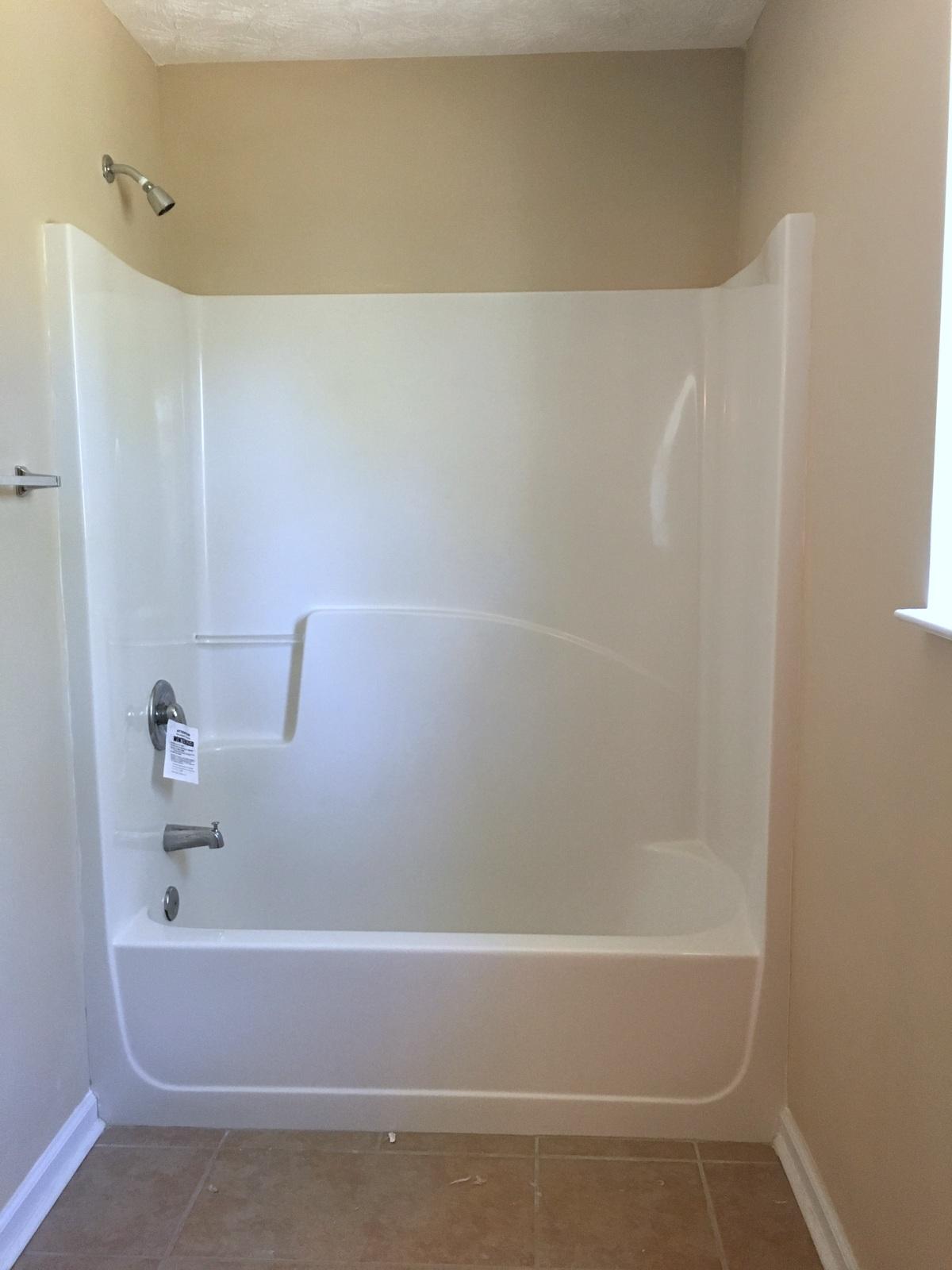 599 Bay Grove Road Freeport, FL 32439 - Photo 22 of 29 a bathroom with a bathtub