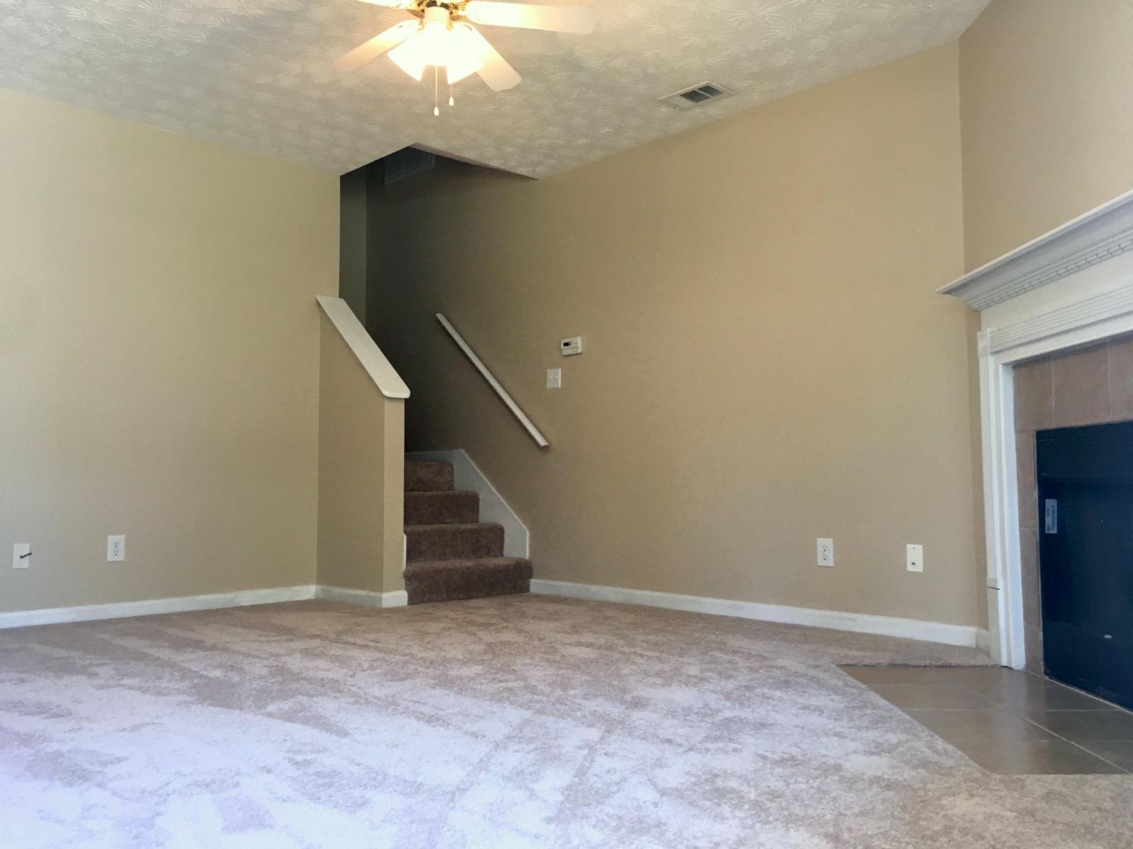 599 Bay Grove Road Freeport, FL 32439 - Photo 4 of 29 a view of an empty room with stairs