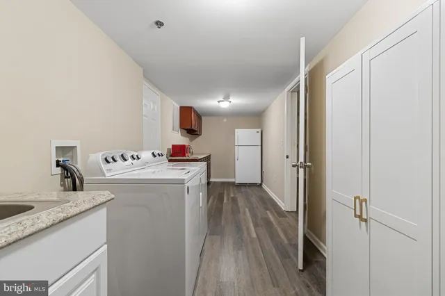 a view of a livingroom with wooden floor