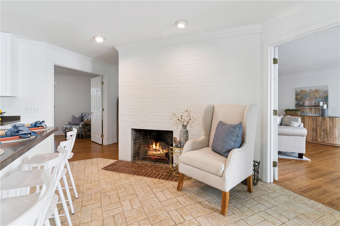 104 Augusta St. Simons Island, GA 31522 - Photo 15 of 63 Fireplace in Kitchen