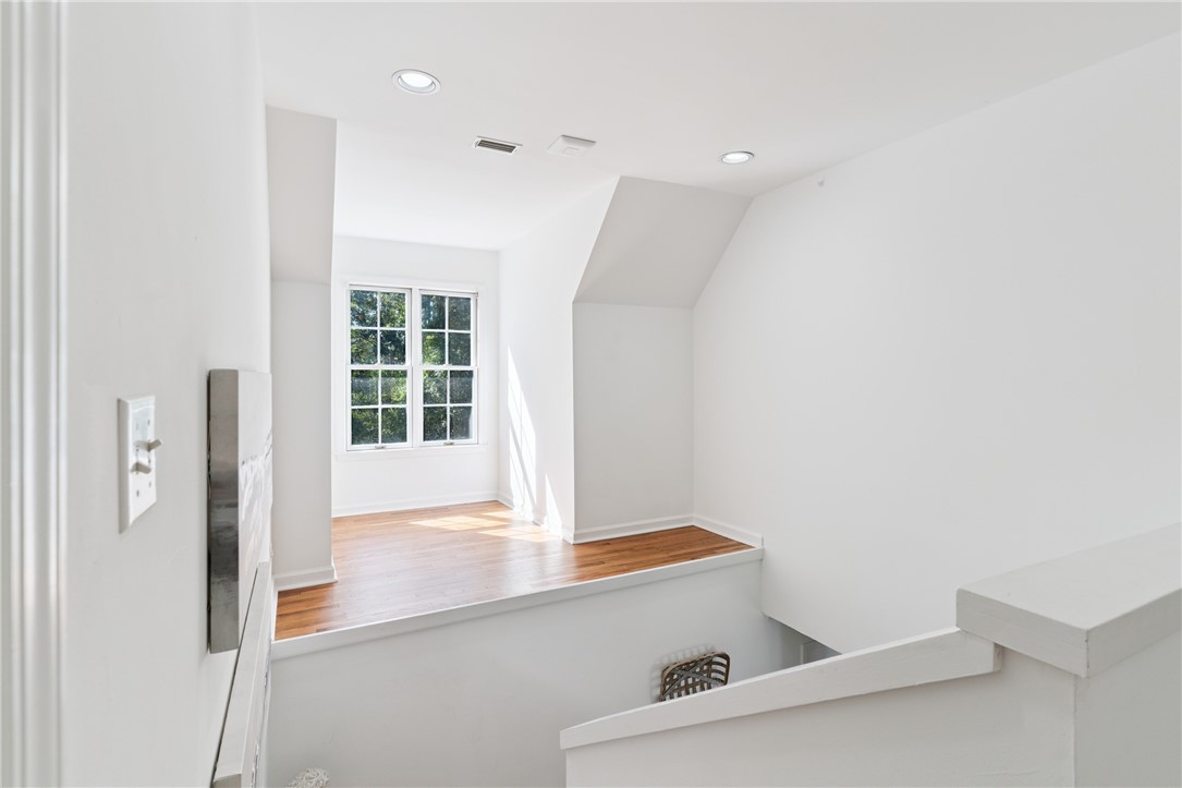 104 Augusta St. Simons Island, GA 31522 - Photo 30 of 63 Staircase window ledge