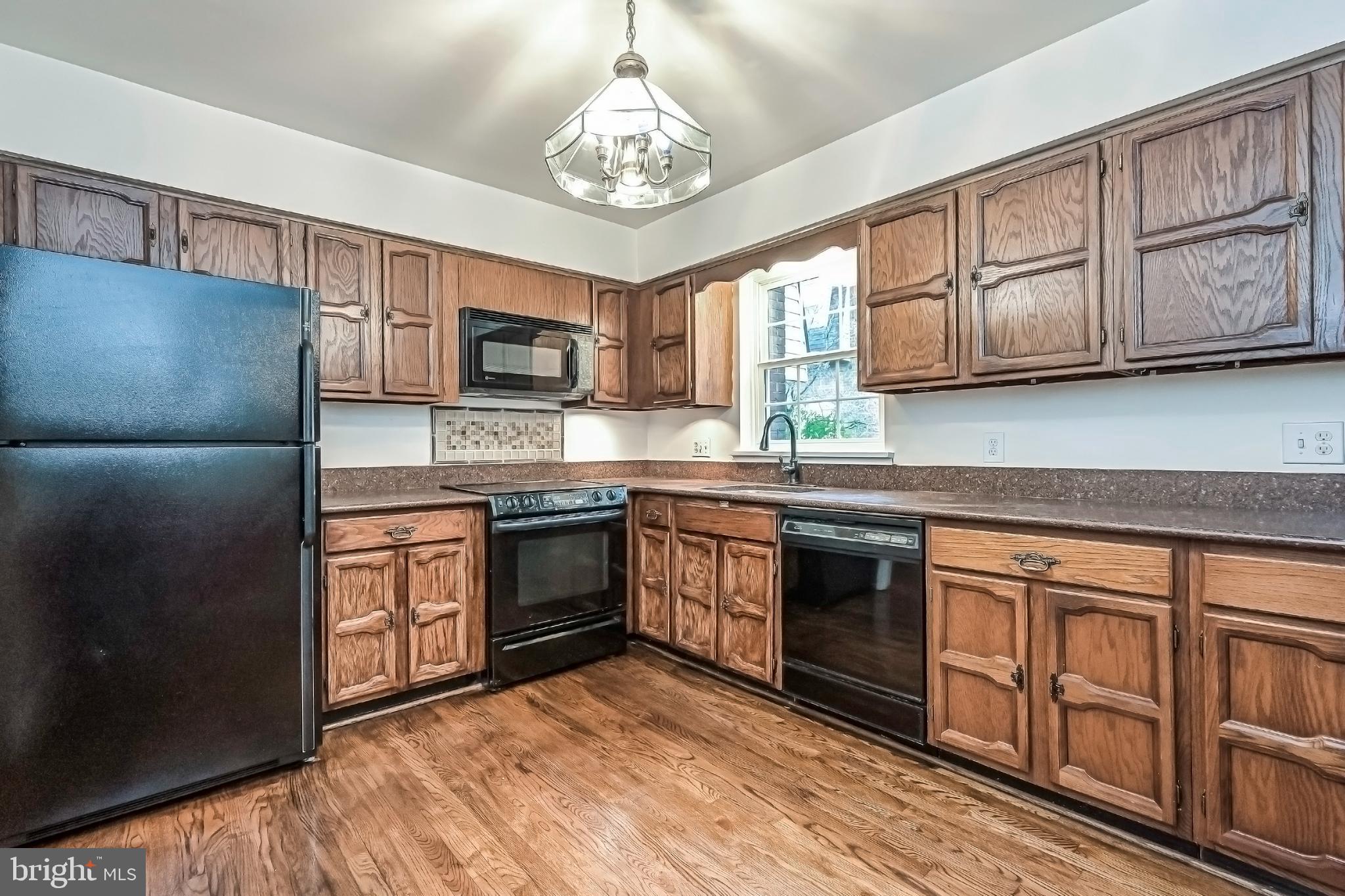 3851 Chain Bridge Road Fairfax, VA 22030 - Photo 8 of 46 Kitchen has hardwood floors
