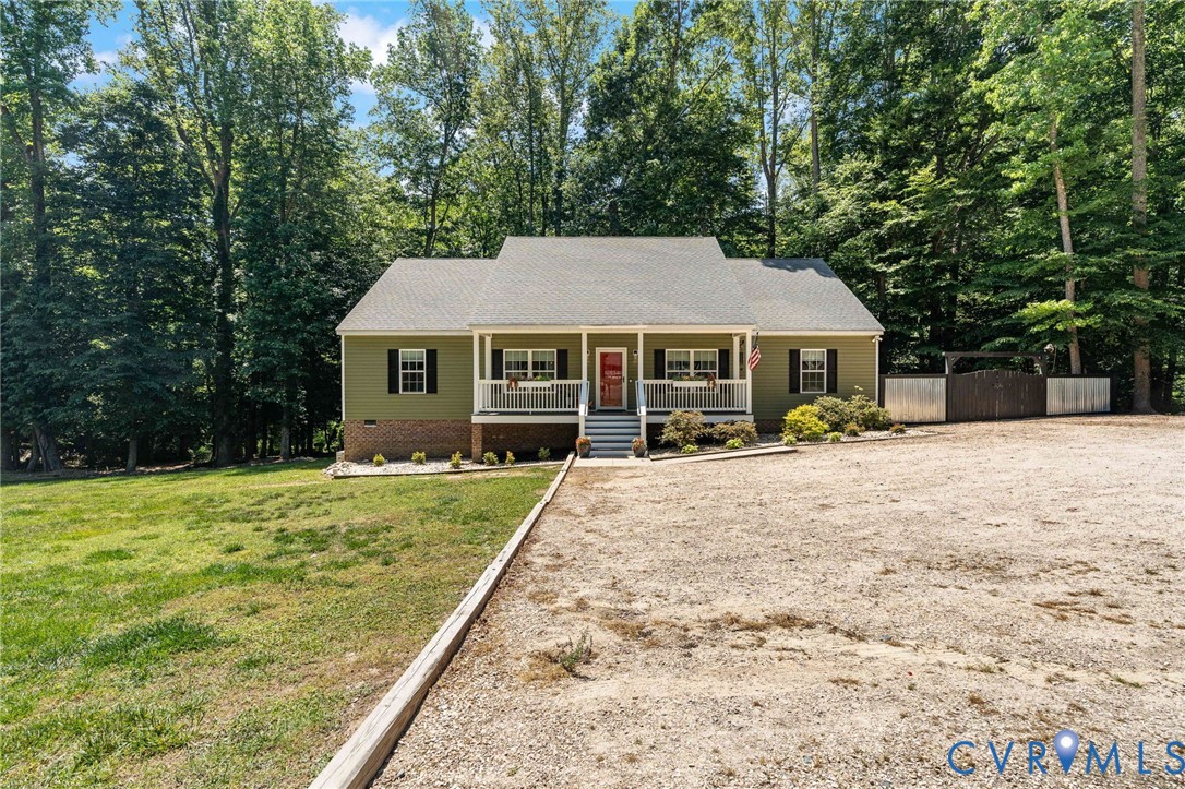 1755 Dispatch Road Quinton, VA 23141 - Photo 76 of 86 a front view of a house with a yard