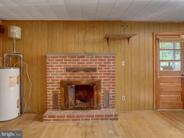 a living room with a fireplace