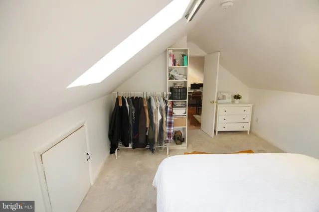 a view of a workspace with furniture