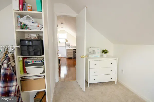 a workspace with furniture and wooden floor