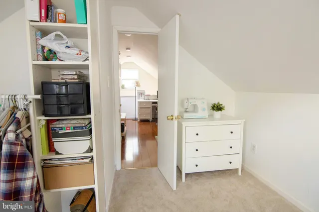 a workspace with furniture and wooden floor