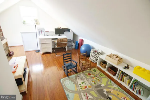 a view of bathroom with sink and mirror