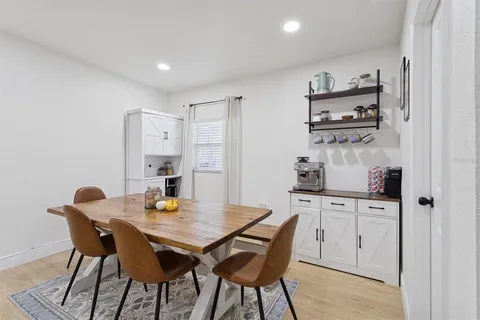 a view of a dining room with furniture