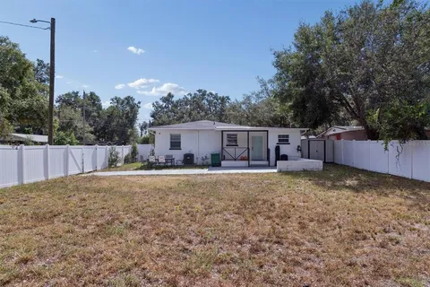 a house view with a backyard space
