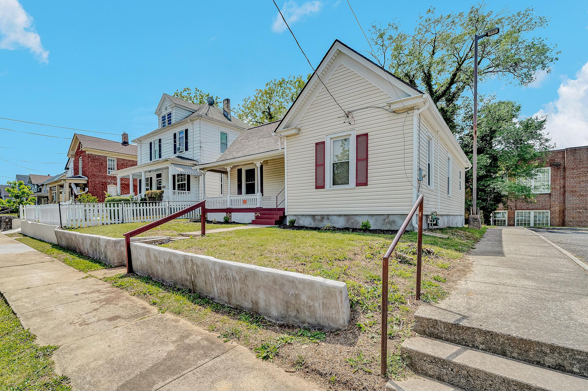 528 Rutherford Avenue Northwest Roanoke, VA 24016 - Photo 2 of 13 a front view of a house with entertaining space