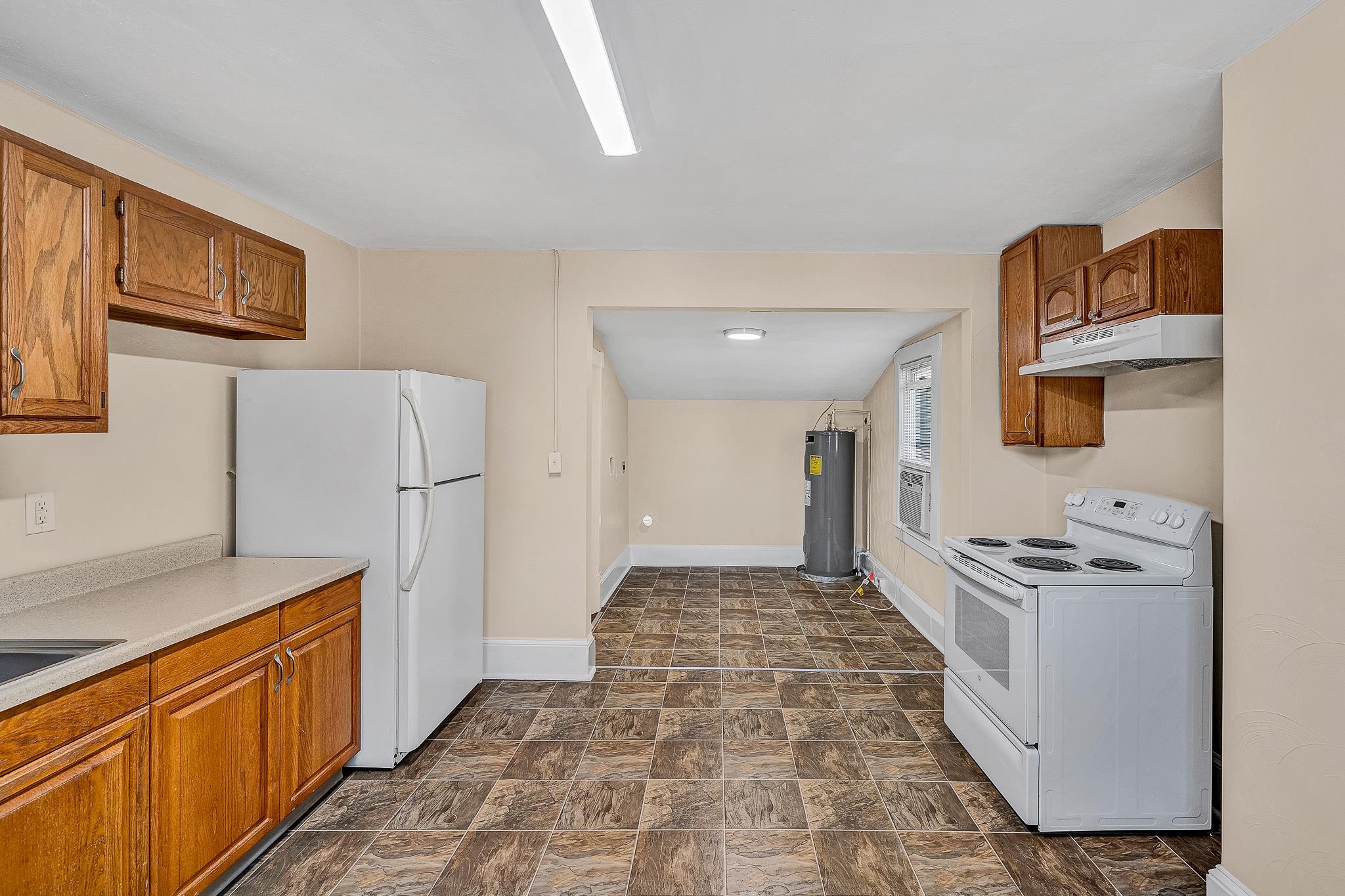 528 Rutherford Avenue Northwest Roanoke, VA 24016 - Photo 10 of 13 a kitchen with stainless steel appliances cabinets and a counter top space