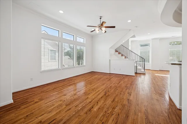 a white toilet sitting next to a white sink