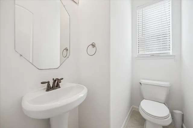 a view of an entryway with wooden floor and stairs