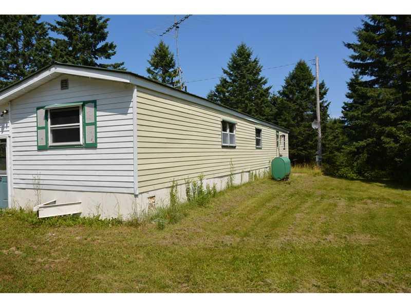 7 Tracy Road Amity, ME 04471 - Photo 2 of 16 Exterior Back.