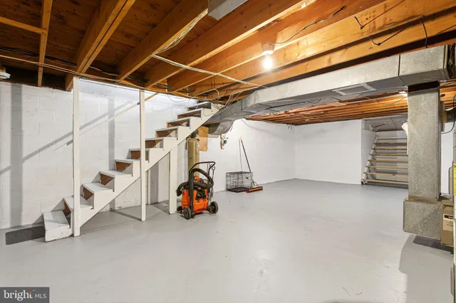 a view of garage with stairs