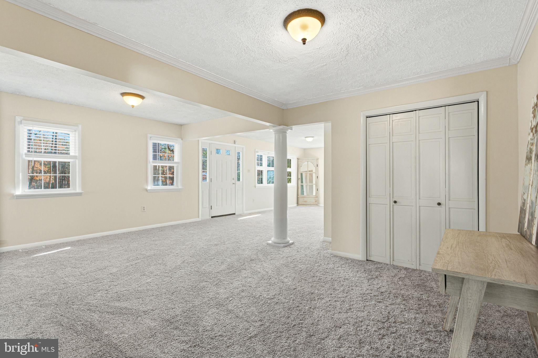 43 Woodside Drive Tabernacle, NJ 08088 - Photo 3 of 35 a view of a livingroom with wooden floor and kitchen space