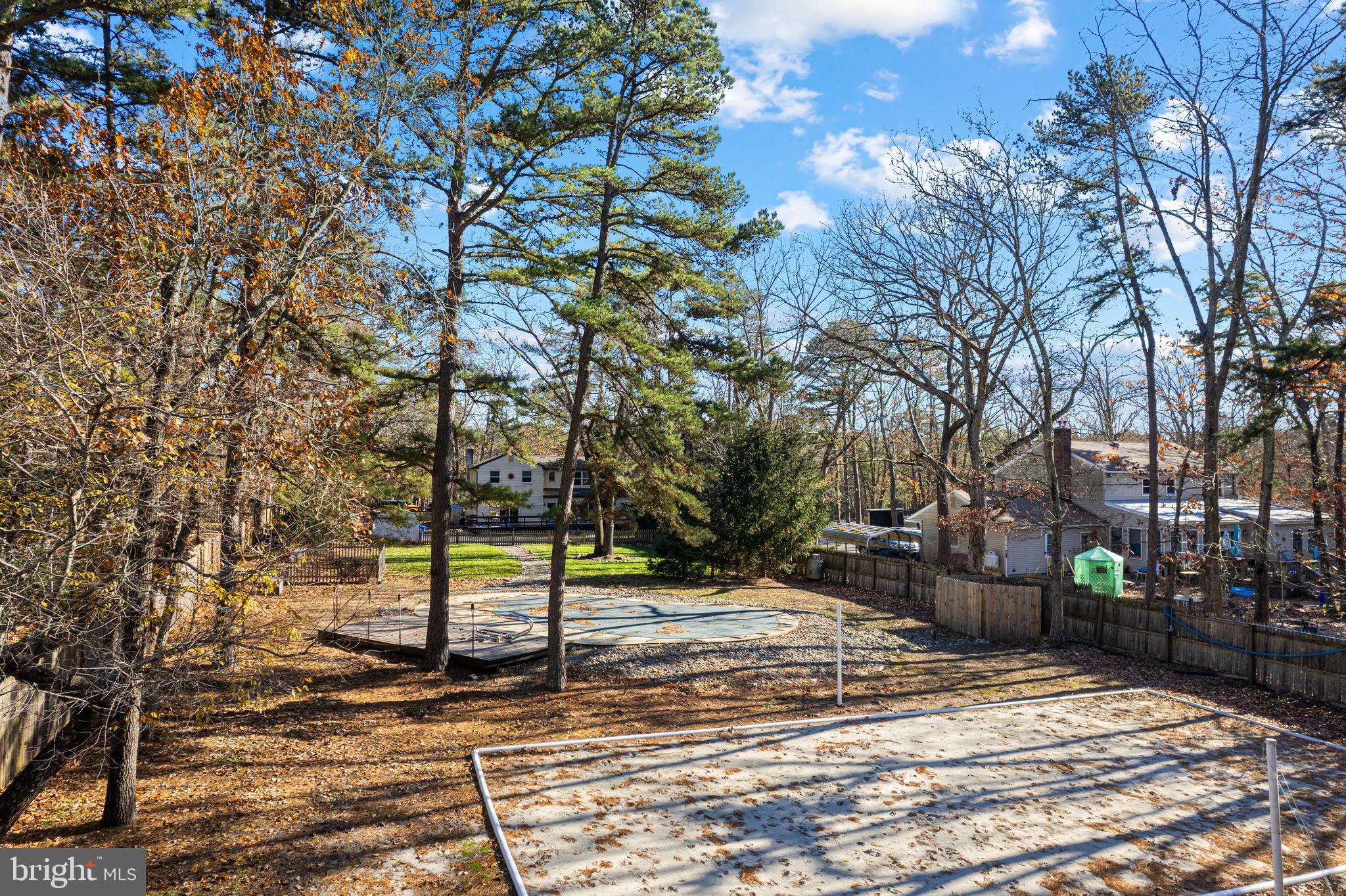 43 Woodside Drive Tabernacle, NJ 08088 - Photo 33 of 35 a view of a yard with a tree