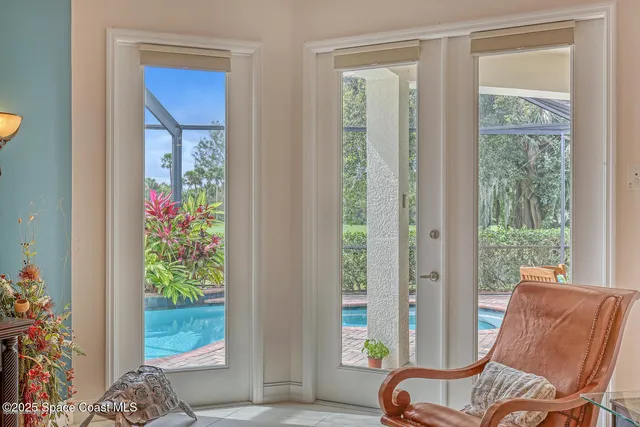 a bathroom with a tub a sink and a mirror
