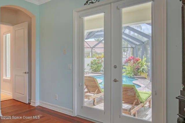 a view of kitchen with cabinets and wooden floor