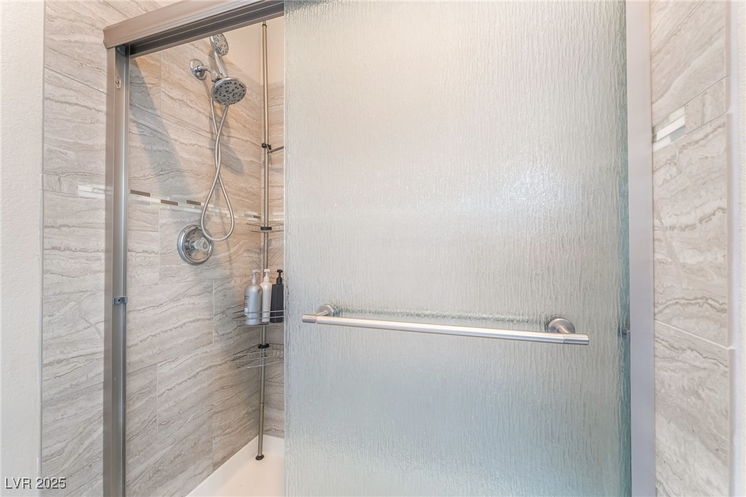 1081 Deep Well Court Henderson, NV 89011 - Photo 28 of 44 Bathroom with a stall shower