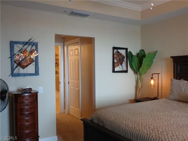 a view of a lounge chairs and table on the wooden floor