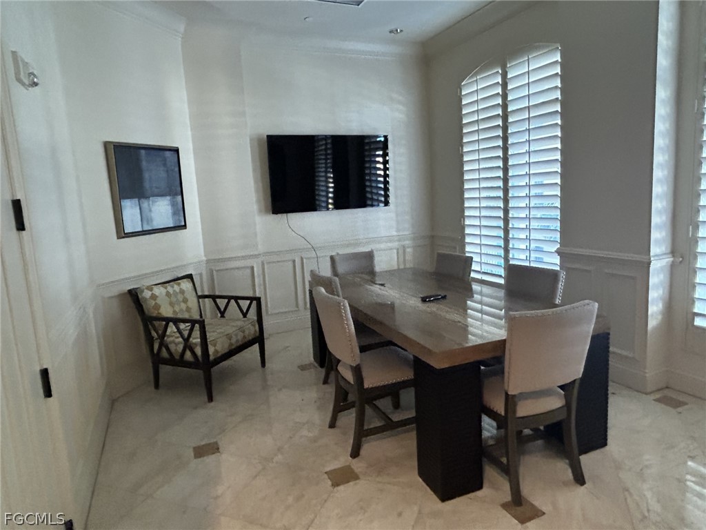 2743 First Street, Unit 1504 Fort Myers, FL 33916 - Photo 25 of 40 a view of a dining room with furniture