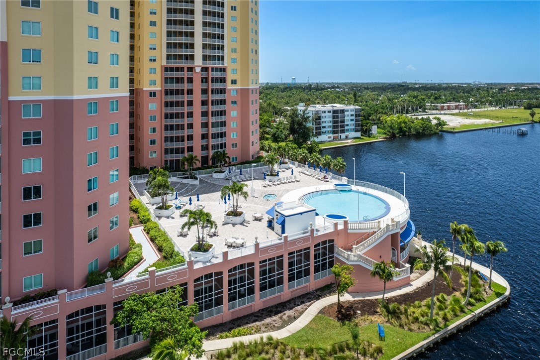 2743 First Street, Unit 1504 Fort Myers, FL 33916 - Photo 29 of 40 a balcony with table and chairs