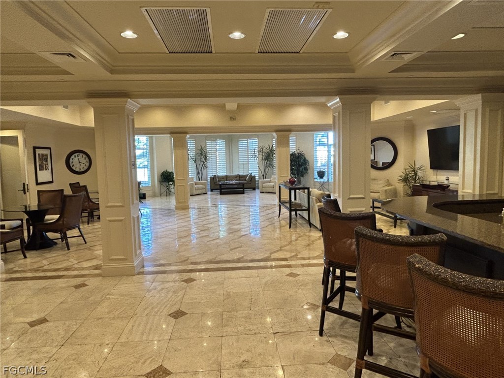 2743 First Street, Unit 1504 Fort Myers, FL 33916 - Photo 33 of 40 a view of a dining room with furniture