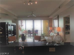 2743 First Street, Unit 1504 Fort Myers, FL 33916 - Photo 6 of 40 a room with lots of table and chairs