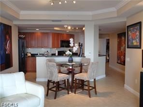 2743 First Street, Unit 1504 Fort Myers, FL 33916 - Photo 7 of 40 a living room with furniture and a dining table