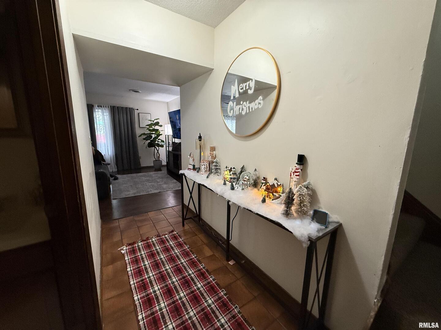 400 East Hester Street Carbondale, IL 62901 - Photo 17 of 24 a bathroom with a sink mirror and a shower