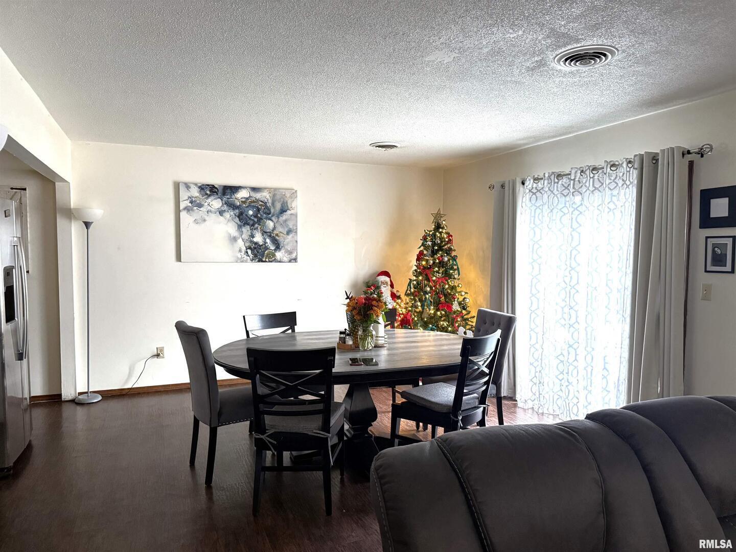 400 East Hester Street Carbondale, IL 62901 - Photo 8 of 24 a view of a dining room with furniture and window