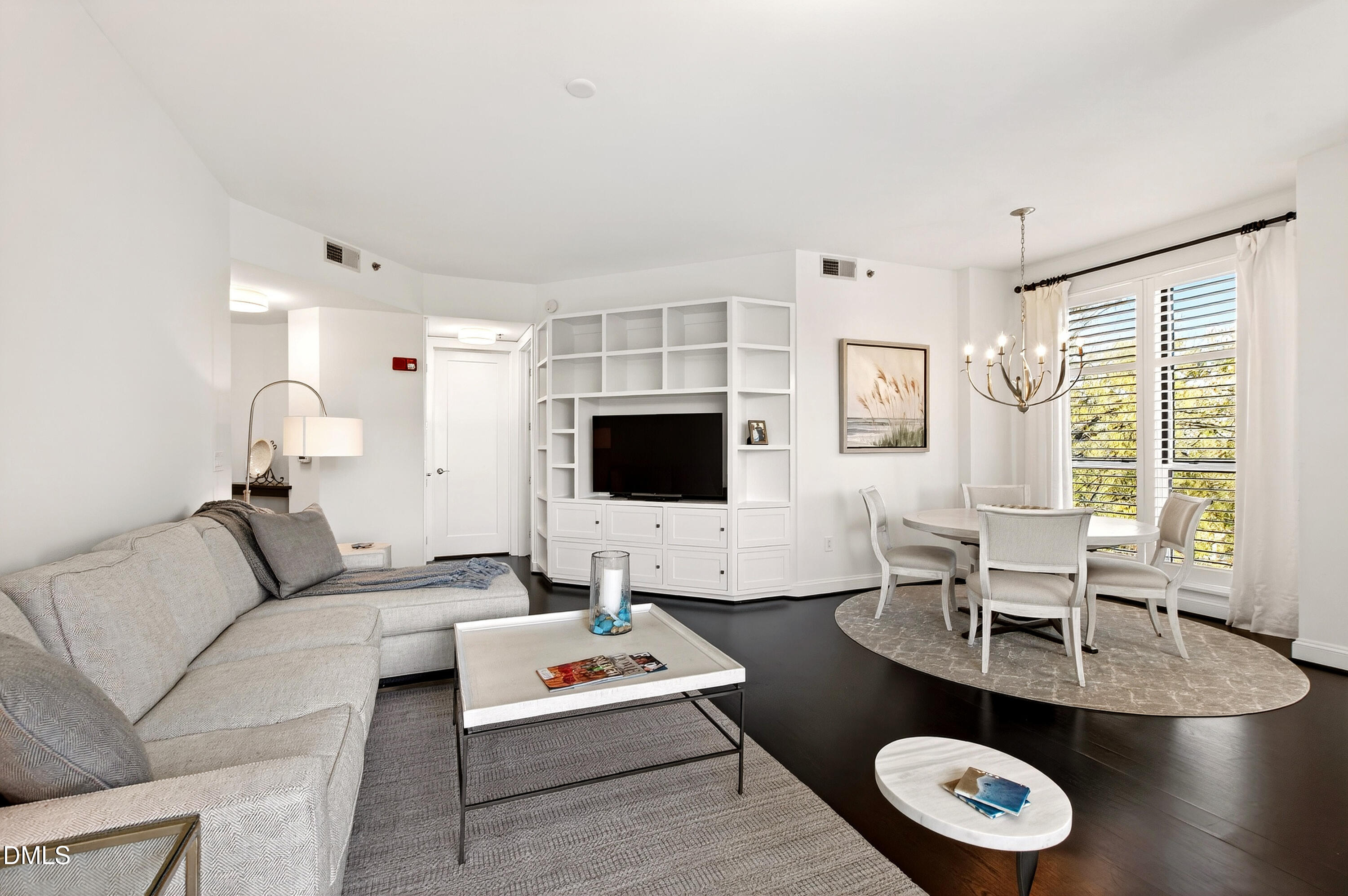 618 North Boylan Avenue, Unit 506 Raleigh, NC 27603 - Photo 10 of 71 a living room with furniture and a flat screen tv