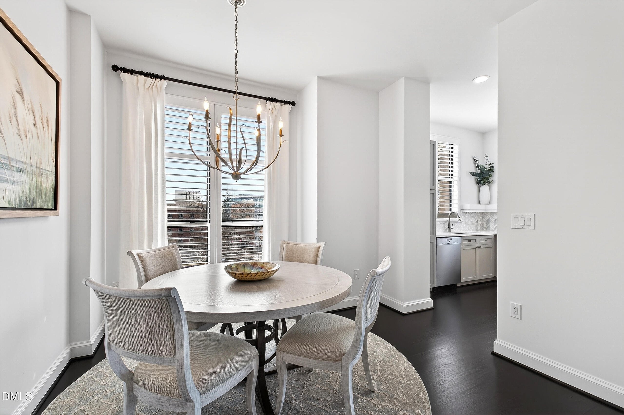 618 North Boylan Avenue, Unit 506 Raleigh, NC 27603 - Photo 13 of 71 a view of a dining room with furniture window and wooden floor