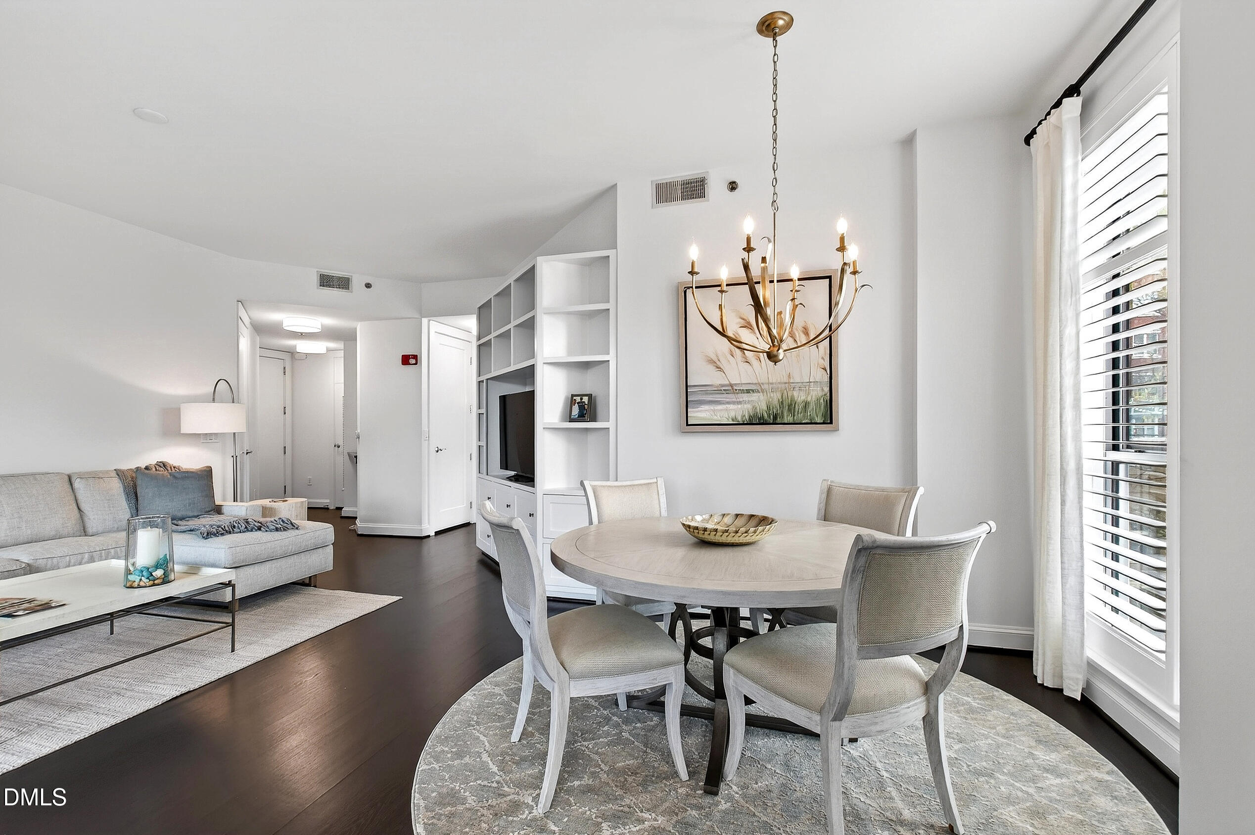 618 North Boylan Avenue, Unit 506 Raleigh, NC 27603 - Photo 14 of 71 a view of a dining room with furniture window and wooden floor