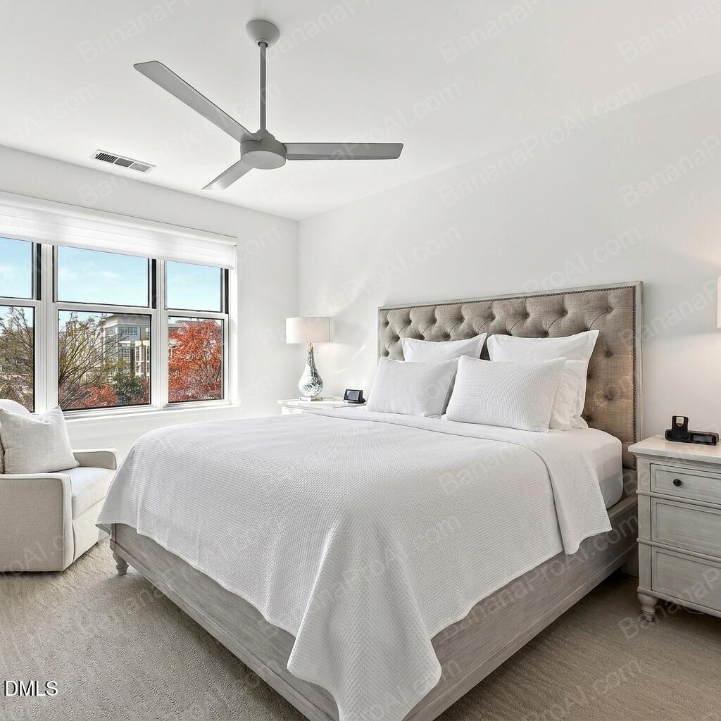 618 North Boylan Avenue, Unit 506 Raleigh, NC 27603 - Photo 23 of 71 a bedroom with bed and large window